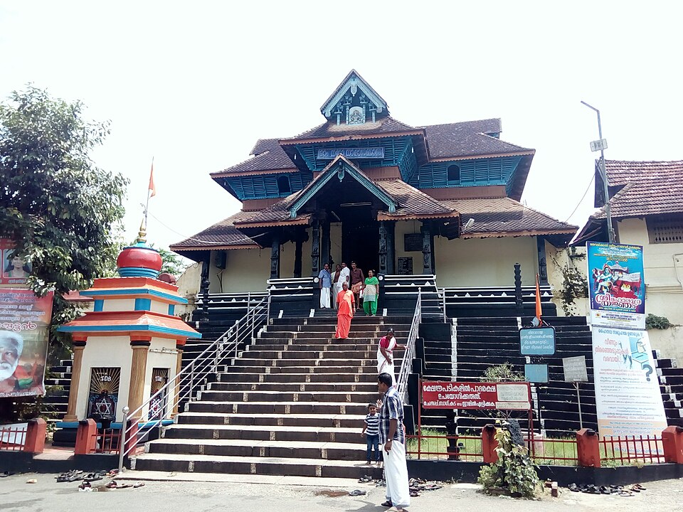 Aranmula Parthasarathy Temple — the ancient Vishnu temple on the banks of the Pampa River in Pathanamthitta, Kerala, whose chief priest summoned the Kannan artisans who accidentally discovered the metal alloy for Aranmula Kannadi approximately 400 years ago