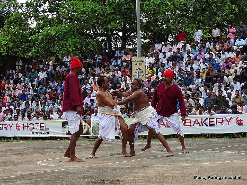 Onathallu palm combat game at Kunnamkulam, Kerala (2014) — the traditional open-palm strike competition that is one of the most competitive and culturally significant of Kerala's Nadan Kalikal folk games, played during the Onam festival with intense community stakes and a direct connection to the Kalaripayattu martial tradition