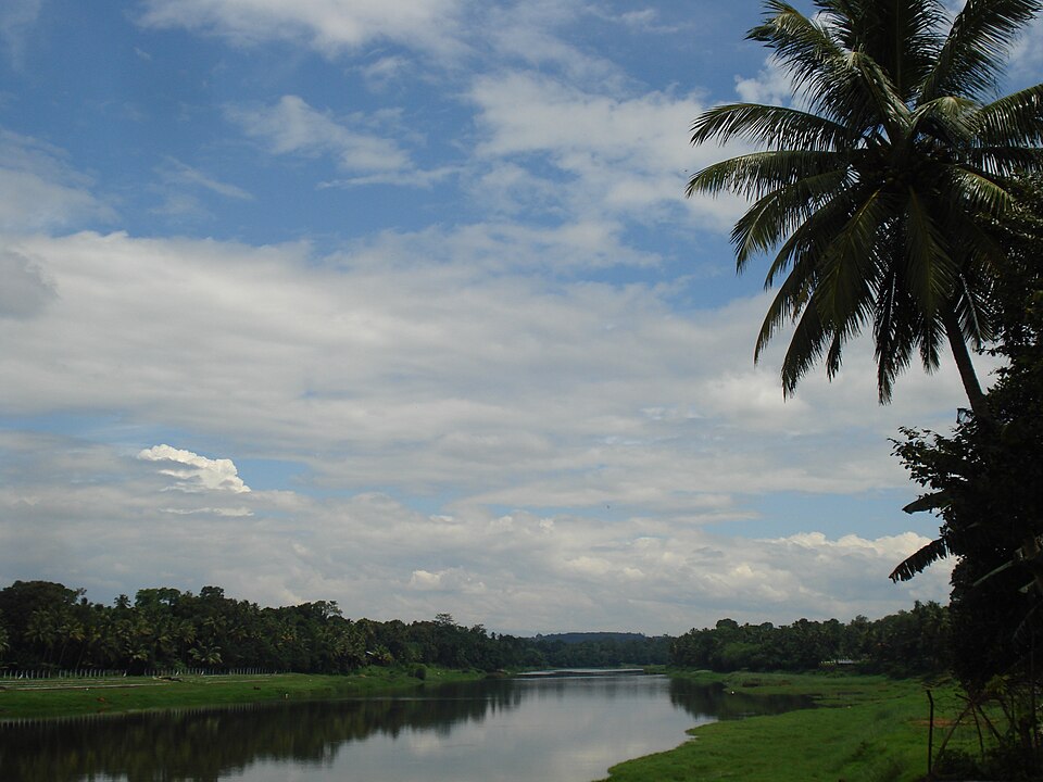 The Pampa River at Aranmula, Pathanamthitta — Kerala's sacred river whose specific riverbank clay is the essential raw material for the Aranmula Kannadi casting moulds, now endangered by flood-driven soil changes