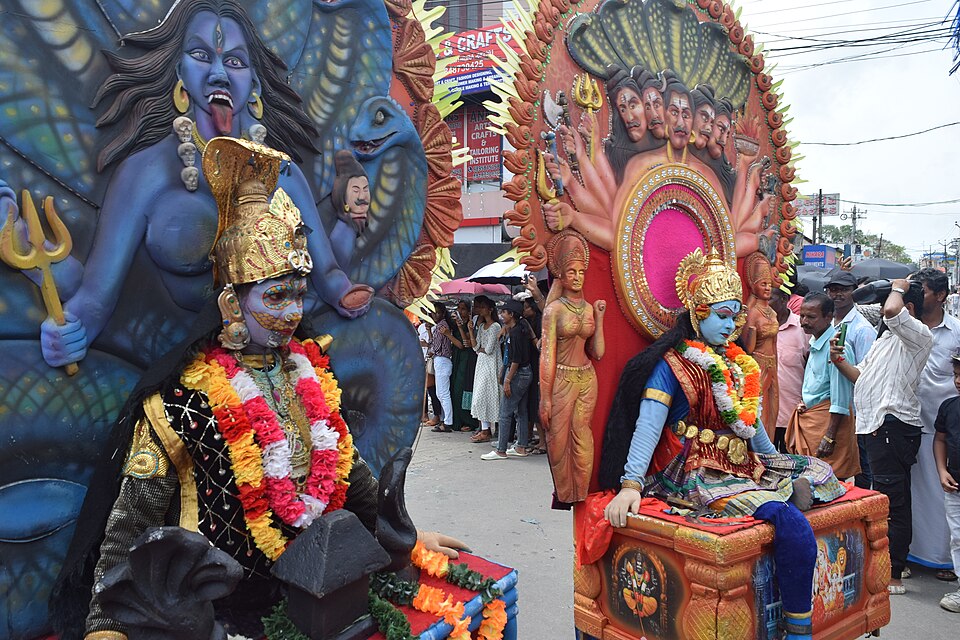 Scene from Athachamayam at Tripunithura — the grand cultural procession held on the first day of Onam (Atham) in Tripunithura, near Ernakulam, featuring caparisoned elephants, traditional orchestras, cultural tableaus, and folk art performers representing Kerala's diverse artistic heritage, marking the official opening of the Onam festival season
