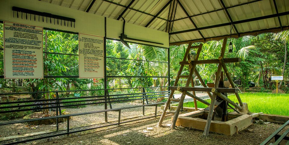 Traditional water wheel used for irrigation in Kerala — the folk technology that gave rise to proverbs about the relationship between human effort, mechanical ingenuity, and the bounty of the earth